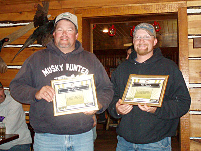 Dale and a friend with a fishing award